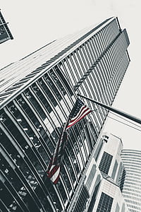 ant view building near American flag thumbnail