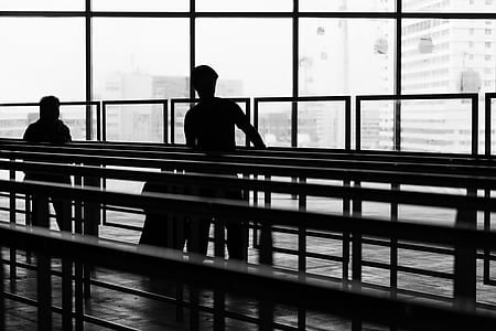 two silhouette person leaning against on railings thumbnail