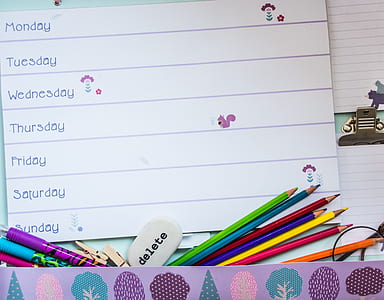 week organizer and coloring pencils thumbnail