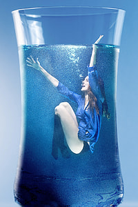 women's black panty and blue long-sleeved shirt on the water thumbnail