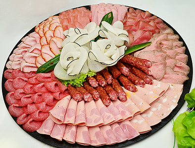 assorted cold cuts in black round tray thumbnail