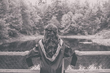 woman looking at lake thumbnail
