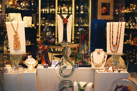 jewelry of rack beside vase thumbnail