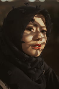 closeup photo of woman wearing black scarf thumbnail