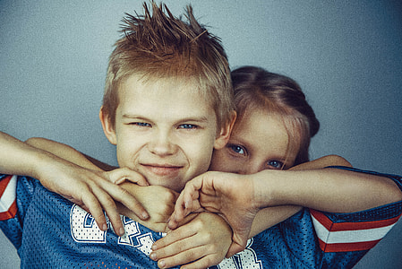 boy wearing blue and white shirt thumbnail