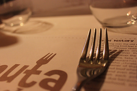 gray stainless steel fork near clear glass bowl thumbnail