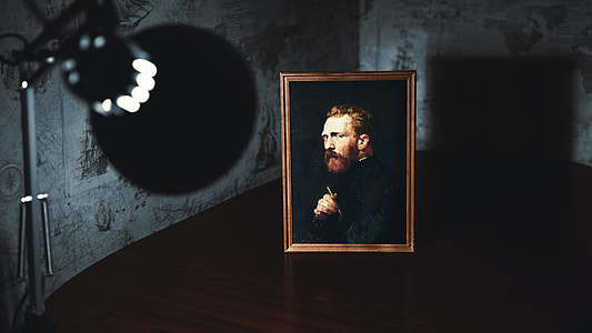 black and brown painting of man with frame thumbnail