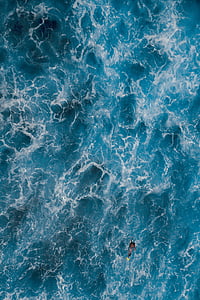 man on body of water thumbnail