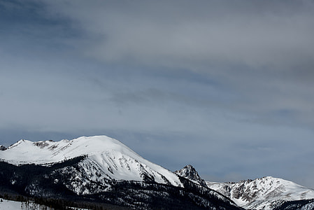 snowy mountain under blue sky during daytime thumbnail