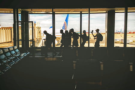 people gathering airport waiting area thumbnail