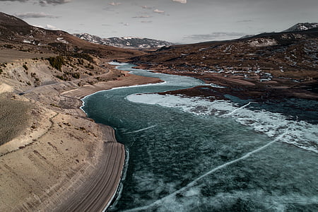 aerial photo of body of water during daytime thumbnail