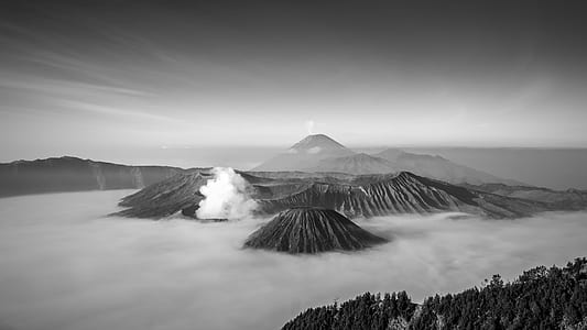 aerial view of mountain range covered with clouds thumbnail
