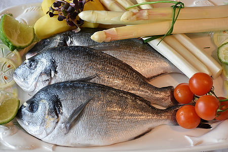 three gray fish on white plate thumbnail