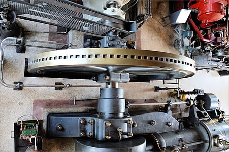 gray and brown machinery with wheel thumbnail