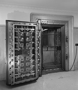 open gray metal vault door thumbnail