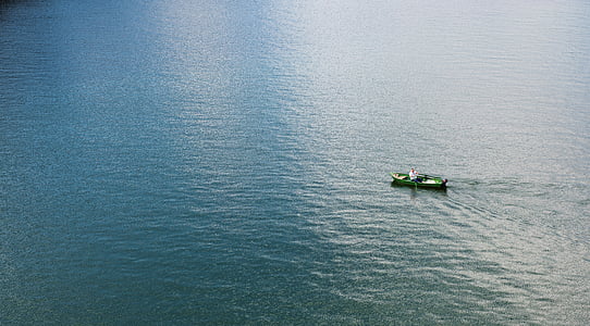 boat on body of water during daytime thumbnail