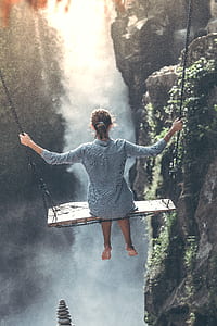 woman sitting on swing thumbnail
