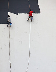 two men painting wall thumbnail
