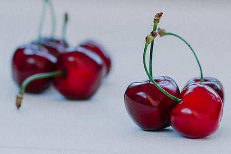 cherries on white surface thumbnail