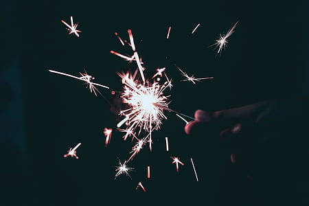 person holding sparkle thumbnail