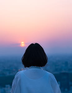 woman looking on the sunset thumbnail