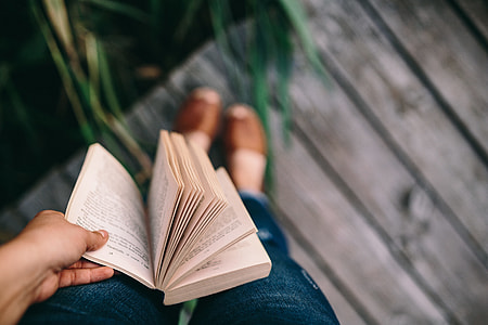 Reading book at lake thumbnail