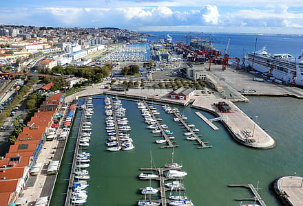 aerial view of boats and houses at daytime thumbnail