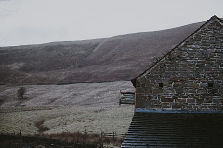photo of brown concrete house thumbnail