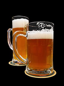 two beer-filled glass mugs thumbnail
