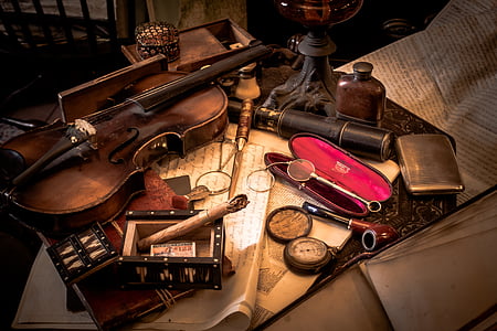 brown violin beside cases thumbnail