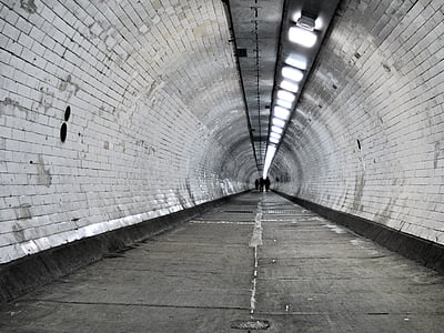 gray painted tunnel with turned on lights thumbnail
