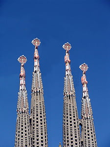 four gray pointed buildings thumbnail