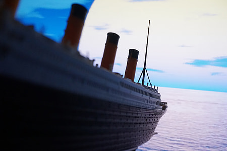 selective focus photography of cruise ship near body of water thumbnail
