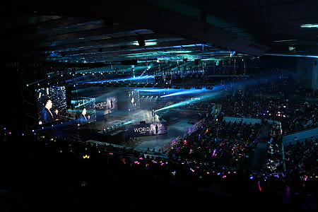 people inside stadium with stage and lights thumbnail