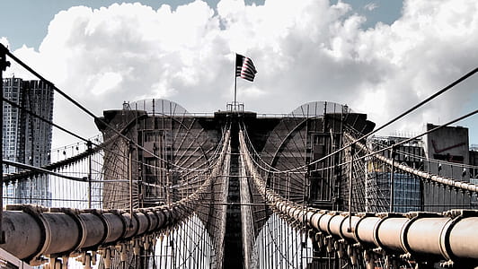 gray metal bridge under white skies thumbnail