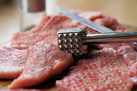 raw meat with gray steel mallet photo thumbnail