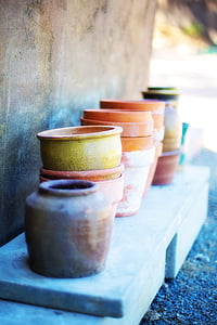 selective focus photography of brown planter pot thumbnail