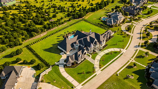 aerial photography of gray concrete house thumbnail