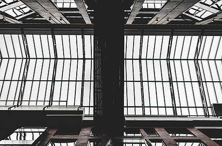 black steel framed roof panel under white sky thumbnail