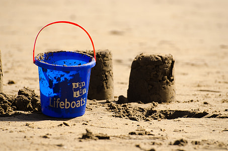 blue Lifeboats bucket beside sand formation thumbnail
