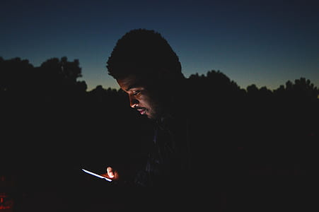 man holding smartphone thumbnail