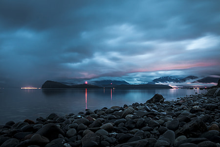 body of water and rock thumbnail