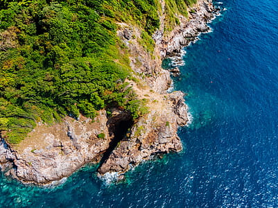 Green and Brown Island Aerial Shot thumbnail