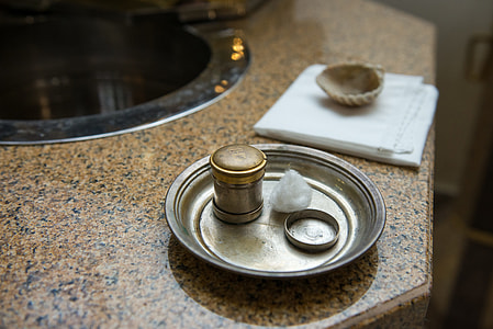 round stainless steel tray with round brown container thumbnail