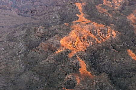 aerial photography of black and brown landscape thumbnail