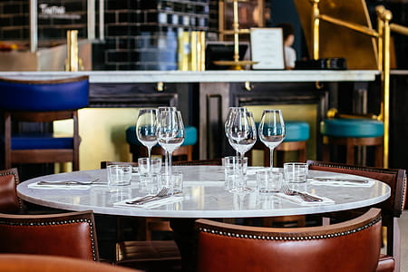 Photo of Different Empty Glasses on Table thumbnail
