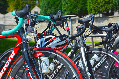 road bikes parked on side walk thumbnail