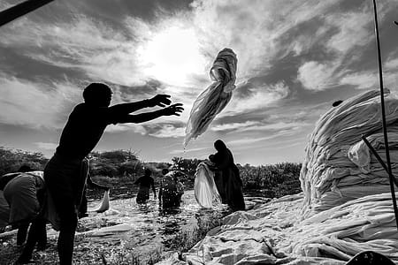 Man Throwing Garment thumbnail