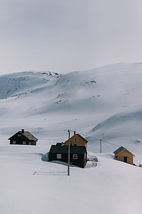 four houses on snowfield thumbnail