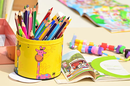 photo of coloring pencils on yellow container thumbnail